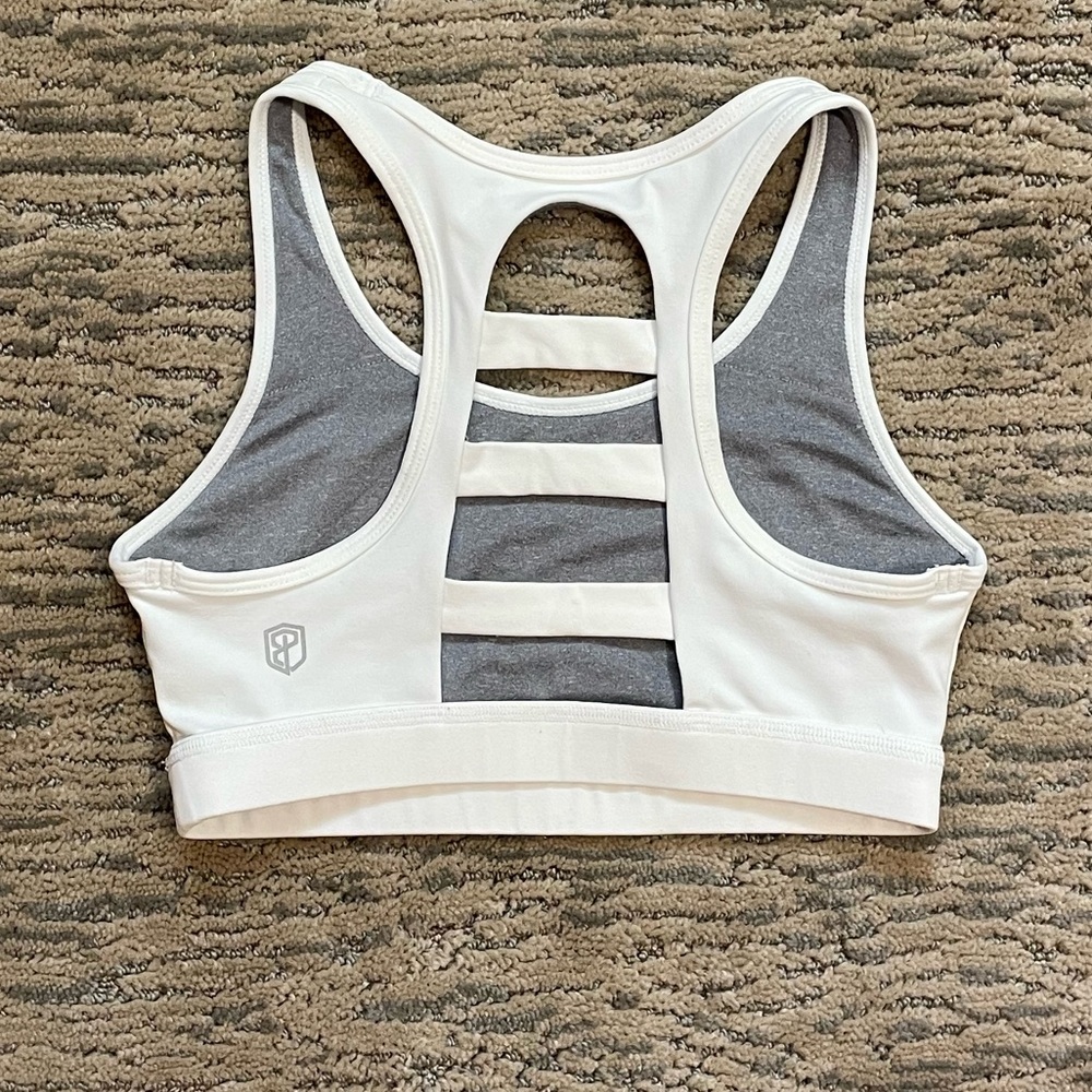 Born primitive white strappy back like new sports bra